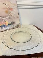 top view of clear glass platter on cloth