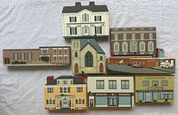 All eight Cat's Meow Village wooden buildings laid out