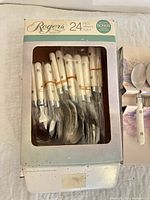 Boxed Rogers 24-piece service for 4 flatware set