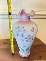 Full view of vase with tape for height reference