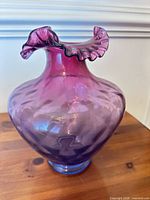 Full view of vase showing color gradient and ruffled rim