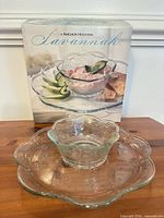 Box, platter, and dip bowl displayed together showing full set and branding