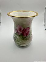 Full view of vase front showing floral decoration