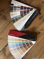 Both Benjamin Moore colour fan decks side by side