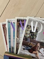 Front covers showing Architectural Digest branding and celebrity cover stories