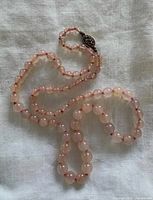 Full view of entire strand showing beads and clasp