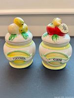 Both jars front view showing labels and color scheme