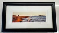 Full view of framed photograph showing image, mat and frame