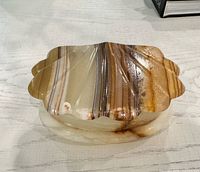 Closed onyx shell trinket box top view showing veining