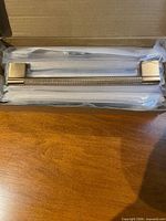 Pull in box with protective sleeves