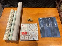 Overview of wallpaper rolls, Smart Tiles packs, LED cork lights