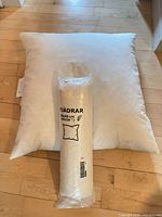 Larger 65x65 pillow insert with sealed 50x50 insert in front