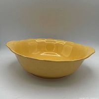 Top view of yellow scalloped serving bowl