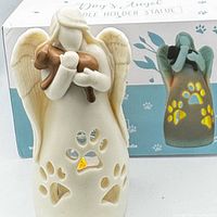 front view of angel candle holder with box