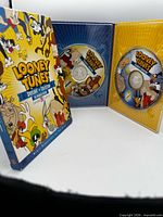 Slipcover, open case showing both DVDs