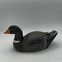 Left side view of painted wood duck decoy