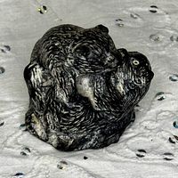 Front angled view of soapstone bear and cub figurine