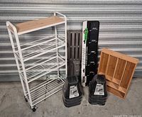 All items grouped together showing coat rack, bed risers, cart, drawer organizer