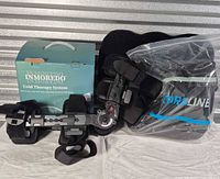 Full lot with hinged brace, cold wrap in bag, and retail box