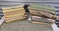 Two stacks of folded upholstery fabric pieces with flat panel front