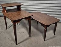 Both nesting tables angled view showing design and legs