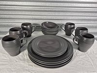 Full set showing all plates, bowls and mugs