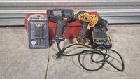 Overall lot with two drills, charger, Kobalt punch set and red toolbox