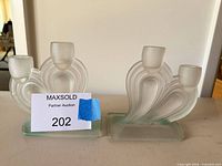 Pair of frosted glass double candle holders front view with MaxSold tag