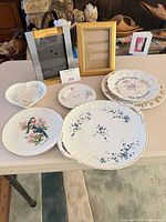 Group shot of five porcelain pieces on table