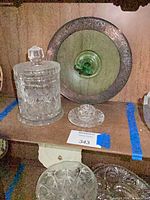 Group showing green pedestal plate, covered candy jar, and two small bowls