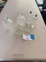 Group view of all six cut crystal pieces on table