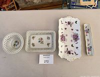 Top view of all four pieces showing designs and shapes