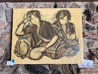 Front view of entire unframed painting of two women with drums, shows size and condition