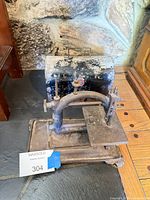 Sewing machine with case showing rust and overall condition