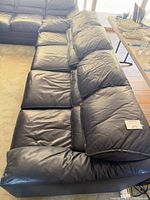 Top angled view showing leather upholstery condition and seat configuration