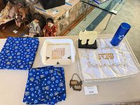 All items in lot displayed together on table