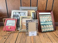 Front view of seven frames showing varied materials, colours and sizes