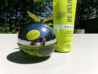 Perfume bottle and body lotion together front view