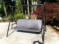 Front view of the swing assembled showing frame and seat