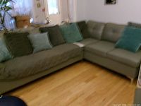 Full view of sectional with pillows