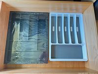 Top view of both cutlery trays inside drawer