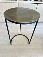 Full view of accent table showing top and legs