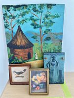 Group shot of all four artworks standing together