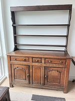 Full view showing both upper shelving section and lower sideboard