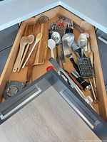 Overall drawer view showing full assortment of utensils and gadgets