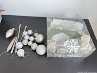 Group view of loose ornaments and storage box