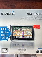 Front of Garmin nüvi 1350LMT box showing product image and lifetime maps & traffic badge
