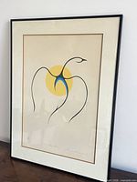 Full view of framed print showing artwork, mat and frame