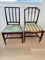 Front view of both chairs showing slat-back and shield-back designs with upholstered seats
