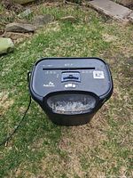 Top view showing Fellowes branding, model designation, controls and feed slot